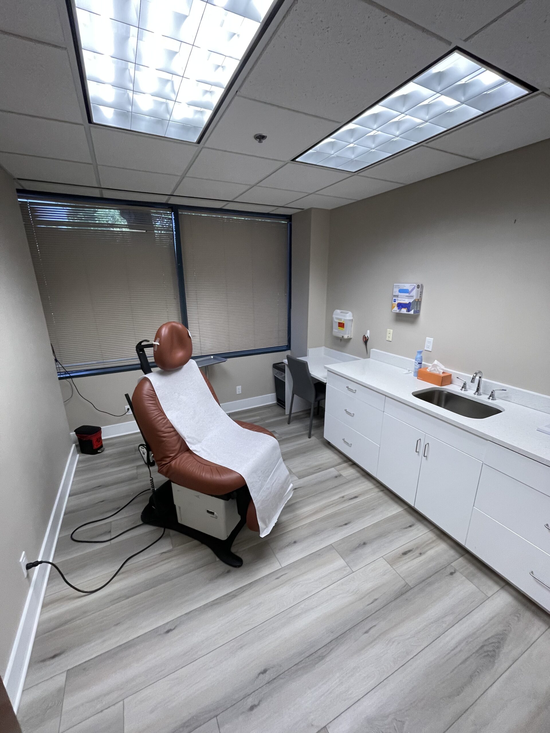 Exam room at OnSpot Dermatology West Palm Beach